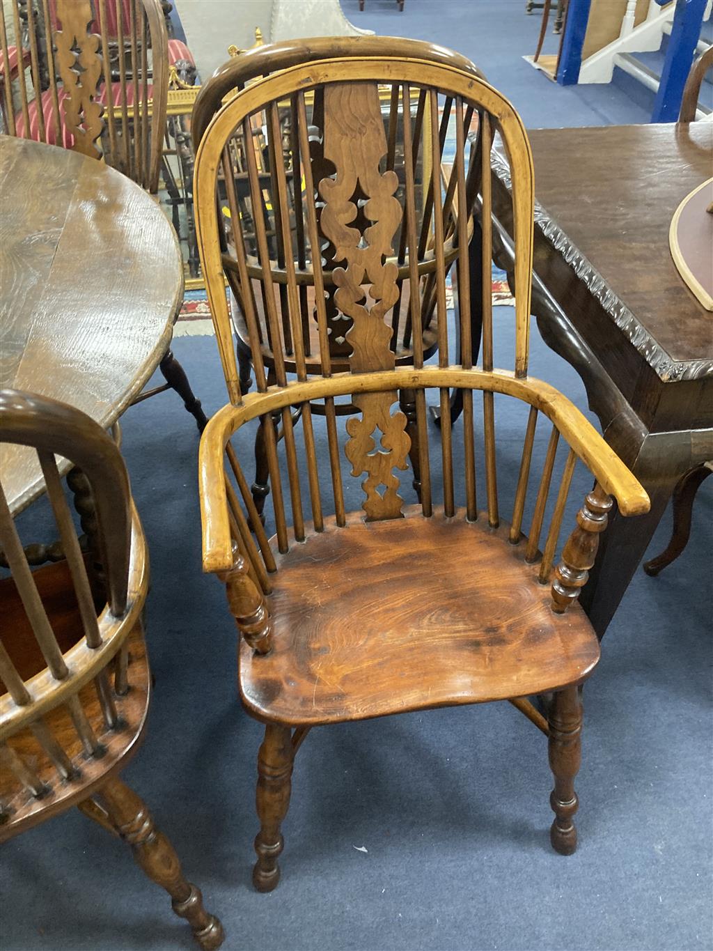 A set of eight 19th century and later Yorkshire area yew, elm and ash Windsor armchairs